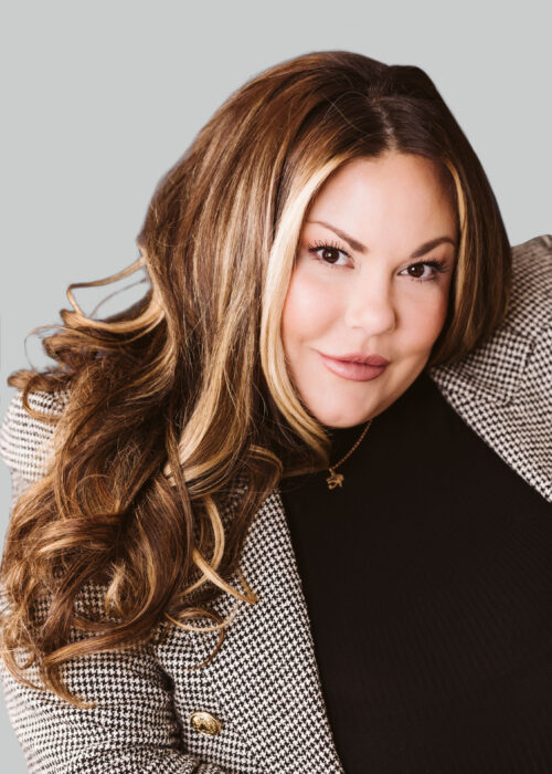 Woman with long hair wearing a blazer