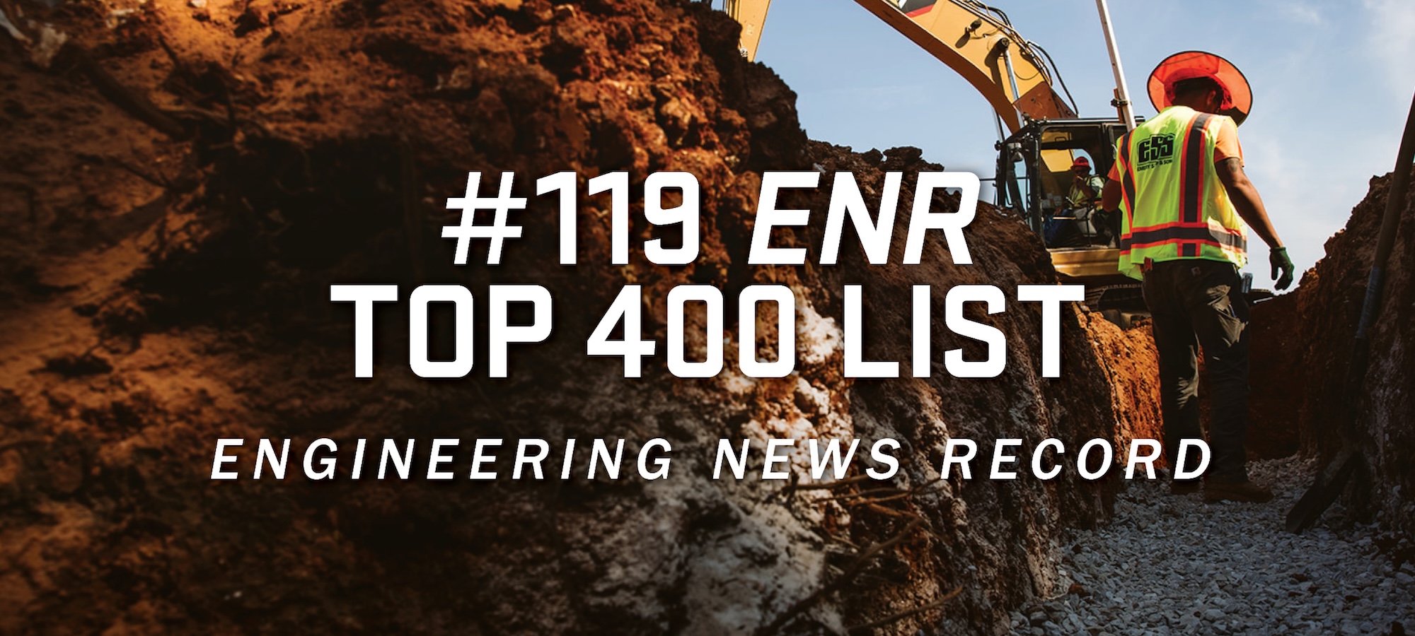 Cover photo of construction worker standing in a trench with text overlay that reads 