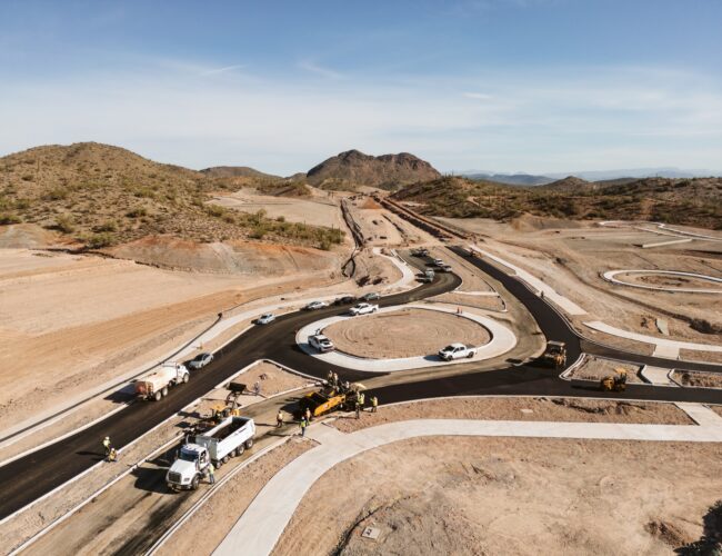 project photo showing aerial view of a round-about in Arizona, asphalt work being done with construction crews present